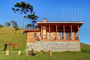 Imagem da galeria de Casa Araguaia Rural Pôr-do-sol. Casa de Campo #18 em Florianópolis mais 21 fotografias