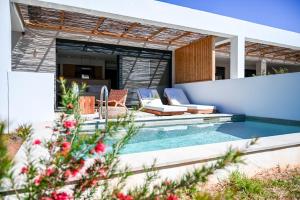 an image of a swimming pool in a house at Acacia - Explore your senses in Preveza
