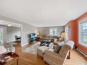 a living room with a couch and a table at Beach House Brought to you by GetAway Vacations in York