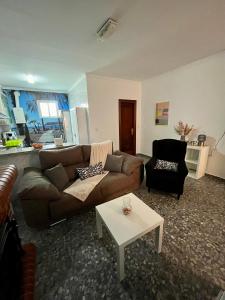 Posedenie v ubytovaní Apartamentos "Un Rico Domingo", Parking solo planta baja
