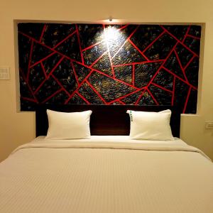 Voodi või voodid majutusasutuse R Hotels By Suraj Residency Yercaud toas