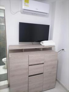 A television and/or entertainment centre at Hostel HA