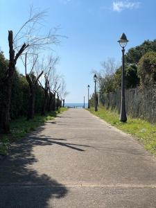 a road with a street light on the side of it at Sunny Room in a cozy Villa in Sperlonga