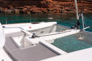 a fishing net on a boat in the water at Catamaran Lagoon 450 in Ibiza Town