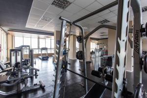 a gym with a lot of equipment in it at ADD Berrini in Sao Paulo
