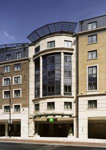 a large building with a large window at ibis Styles London Southwark - near Borough Market in London