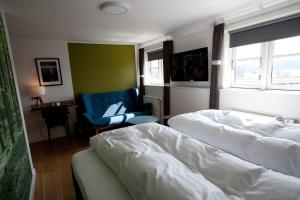 Voodi või voodid majutusasutuse Hotel Kongensbro Kro toas