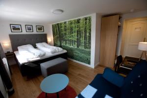 Voodi või voodid majutusasutuse Hotel Kongensbro Kro toas