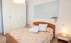 En eller flere senge i et værelse på Ferienwohnung für 5 Personen ca 60 qm in Lido di Specchiolla, Adriaküste Italien Ostküste von Apulien