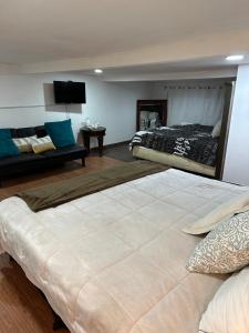 Ένα ή περισσότερα κρεβάτια σε δωμάτιο στο Escape de altura