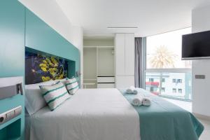 Un ou plusieurs lits dans un hébergement de l'établissement Ferienwohnung für 2 Personen ca 24 qm in Las Palmas de Gran Canaria, Gran Canaria Nordküste Gran Canaria