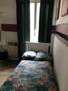 Posteľ alebo postele v izbe v ubytovaní La clef Sithieu