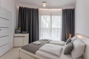 Ліжко або ліжка в номері Ferienwohnung am Meer, Urlaub auf der Insel Usedom, Apartment Tower 12