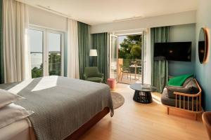 Ένα ή περισσότερα κρεβάτια σε δωμάτιο στο Beautiful Villa Crystalsea 2 with a pool in Hvar +77 φωτογραφίες