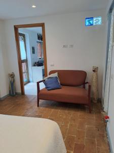 a living room with a couch in a room at Casa Susy in Rome