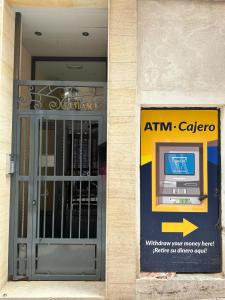 an entrance to an atm center with a door at Vista Corazón in Benidorm