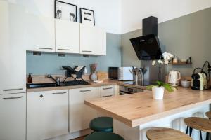 Gallery image of Mon Appart'hôtel - Gare de Limoges - Duplex 2 Chambres - Parking en supp in Limoges