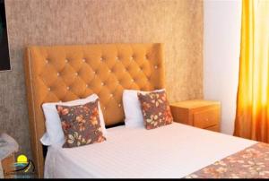 Łóżko lub łóżka w pokoju w obiekcie Hotel las marias de neiba