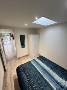 Postel nebo postele na pokoji v ubytování Maisonnette Le Verger, Lac d'Orient, Nigloland.