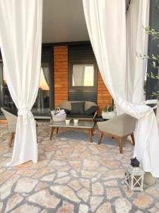 Seating area sa Tolles Ferienhaus in Kornati mit Whirlpool, Terrasse und gemeinschaftlichem Pool