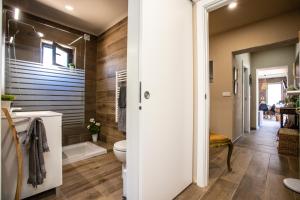 a bathroom with a toilet and a sink at Quinta Santo Antonio in Gouveia +107 photos