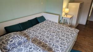 Ένα ή περισσότερα κρεβάτια σε δωμάτιο στο Charmant petit gîte au cœur de la Baie de Somme