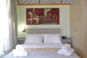 Postel nebo postele na pokoji v ubytování Casa della Fortuna