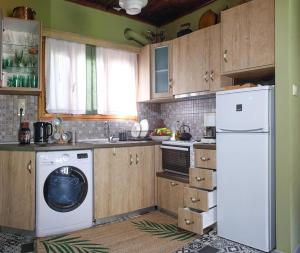 Kuchyň nebo kuchyňský kout v ubytování Casa della Fortuna