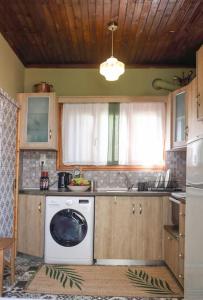 Kuchyň nebo kuchyňský kout v ubytování Casa della Fortuna