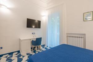 Postel nebo postele na pokoji v ubytování Elite Luxury Suites