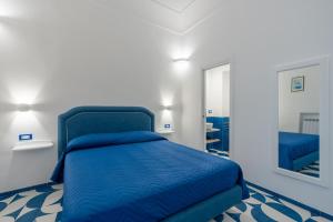 Postel nebo postele na pokoji v ubytování Elite Luxury Suites