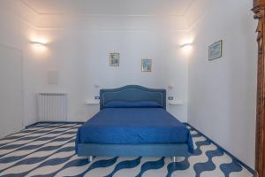 Postel nebo postele na pokoji v ubytování Elite Luxury Suites
