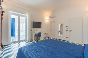 Postel nebo postele na pokoji v ubytování Elite Luxury Suites