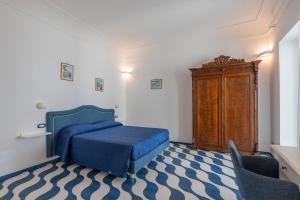 Postel nebo postele na pokoji v ubytování Elite Luxury Suites