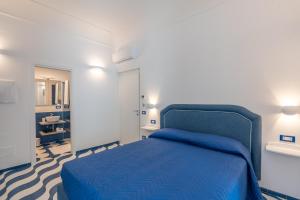 Postel nebo postele na pokoji v ubytování Elite Luxury Suites