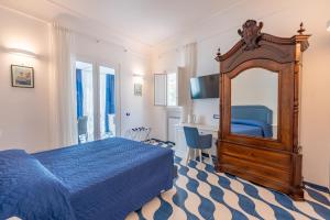 Postel nebo postele na pokoji v ubytování Elite Luxury Suites