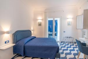 Postel nebo postele na pokoji v ubytování Elite Luxury Suites