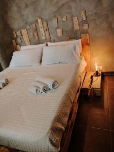 Posteľ alebo postele v izbe v ubytovaní a Fasano la casa di Dony e Nicole