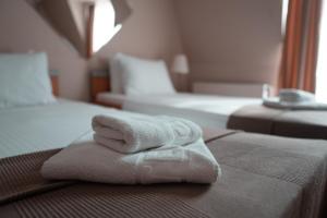 Katil atau katil-katil dalam bilik di Hotel Topcider