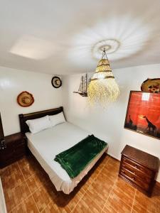 Un pat sau paturi într-o cameră la Azoul Surf Hostel Taghazout
