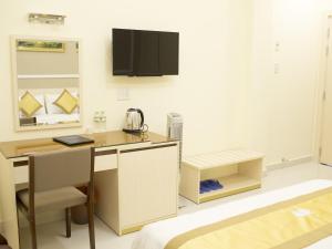 TV a/nebo společenská místnost v ubytování Hotel Hoang Minh Chau
