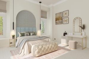 Un dormitorio blanco con una cama grande y una mesa en Carbis Bay and Spa Hotel en St Ives