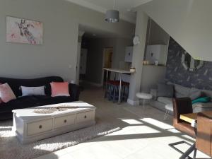 Posezení v ubytování Haven Apartment + 10 fotografií