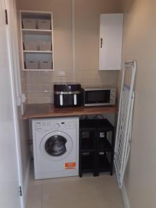 Köök või kööginurk majutusasutuses Haven Apartment