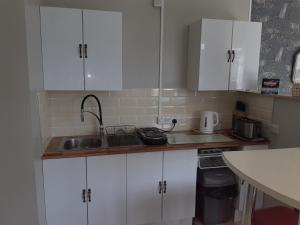 Köök või kööginurk majutusasutuses Haven Apartment