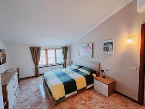 Postel nebo postele na pokoji v ubytování Silla House - A due passi dal lago