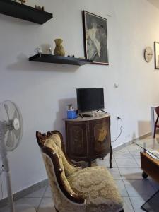 TV a/nebo společenská místnost v ubytování Cosy House