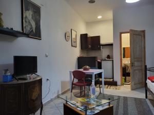TV a/nebo společenská místnost v ubytování Cosy House