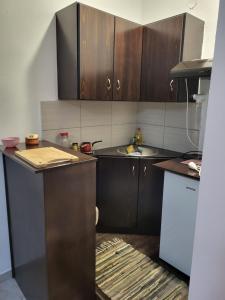 Kuchyň nebo kuchyňský kout v ubytování Cosy House