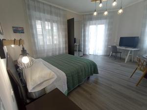 Postel nebo postele na pokoji v ubytování BariVera rooms